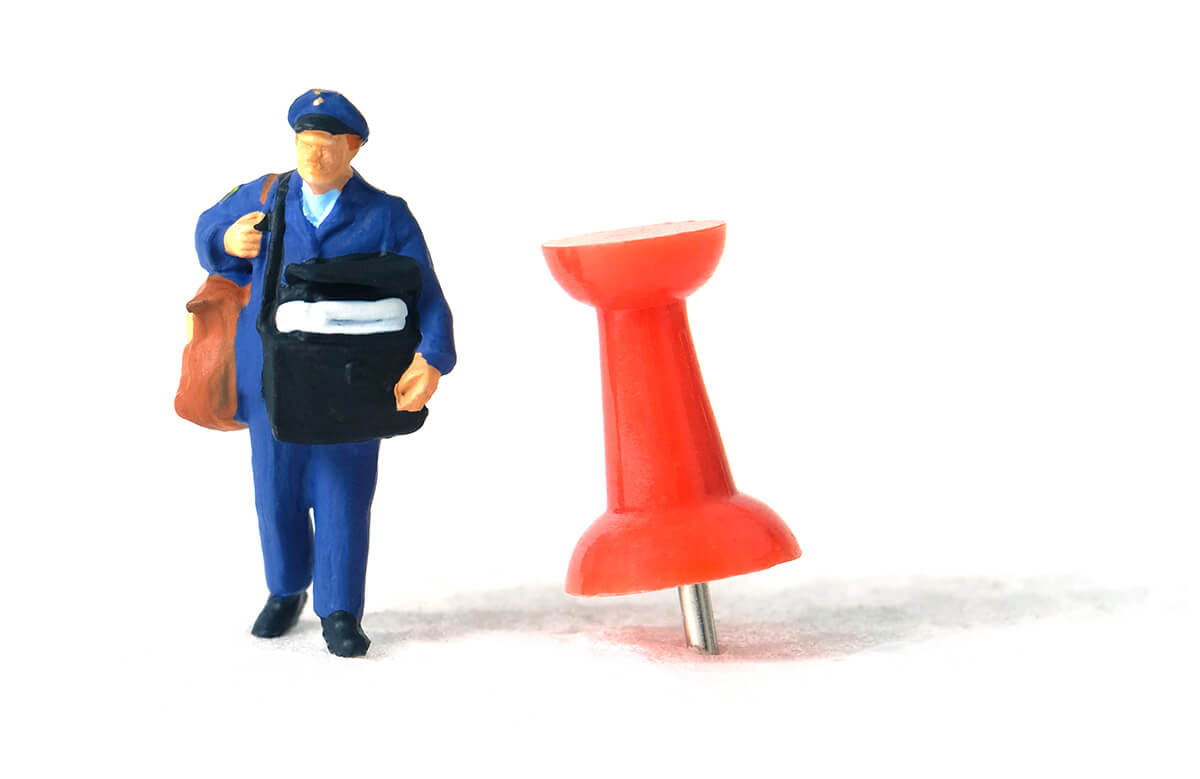 Mailman figurine